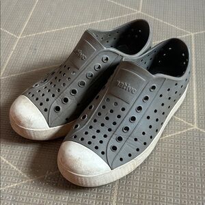 Native Unisex Slip-On Sneakers in Light Gray with Off-White Trim